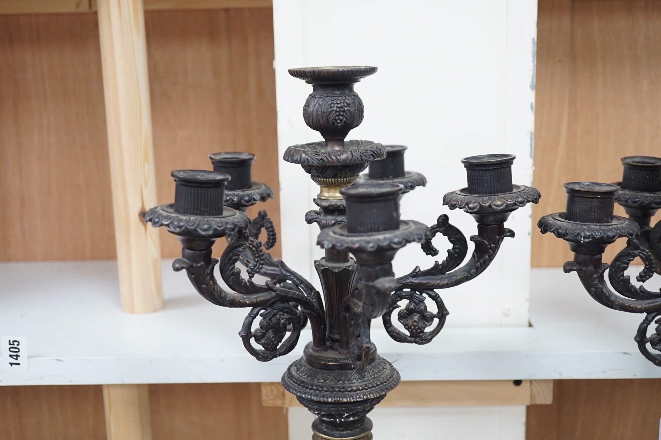 A pair of Empire style bronze candelabra, 71cm tall